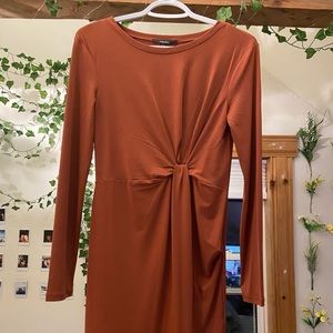 Burnt orange comfy stretchy dress with knot detail.